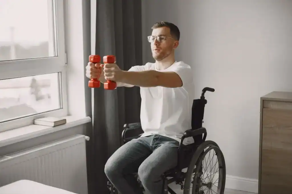 Empowering Weight Loss: A Comprehensive Guide for Individuals with Disabilities 1 Image of man doing exercise in his wheelchair to aid weight loss Tetbury