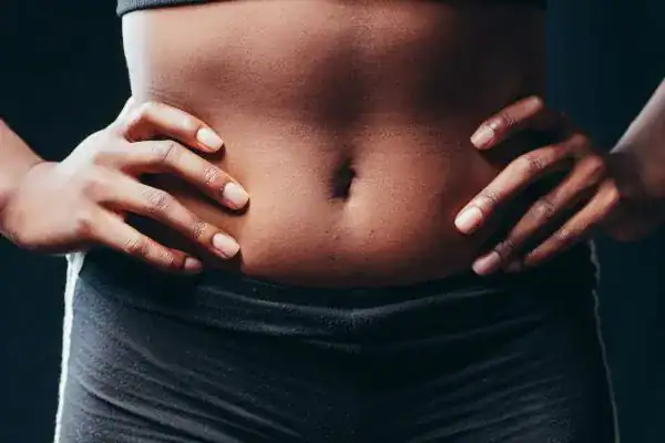 Toning Your Stomach: The Ultimate Guide to Achieving a Sculpted Stomach While Shedding Pounds 1 Image of a toned stomach after non surgical treatment Tetbury